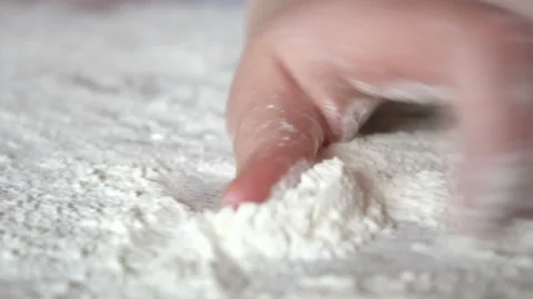 Flour taking by hand from the table Stock Footage 130526946