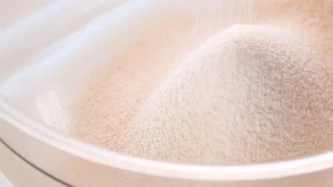 Flour. Texture of rolling flour.Slow motion. Stock Footage 199905711