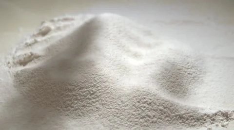 Flour through the sieve falls onto the table. Stock-Footage 60138474