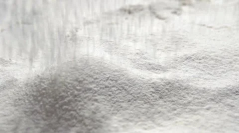 Flour through the sieve falls onto the table. Stock Footage 60138491