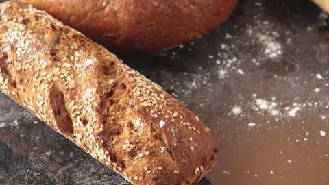 Floured bread and ears of wheat Stock Footage 124154828