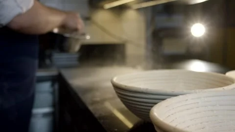 Floured Rattan Proofing Baskets in Artisan Bakery, Baker at Work, Close Up Shot Stock Footage 341346837
