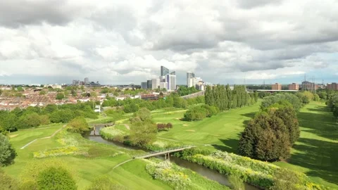 Flow of brook through golf course in town Vídeos de archivo 155813952