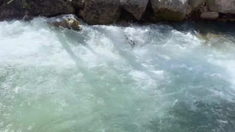 Flow of clean water in a mountain river Stock Footage 331304874