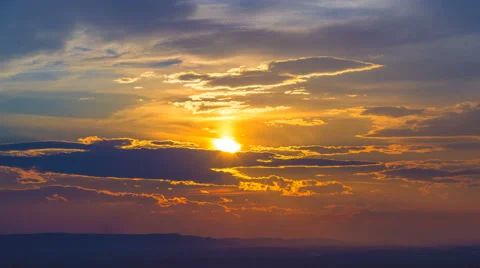 The flow of cloud against the background of sunset. Time lapse. Wide angle Stock-Footage 61752370