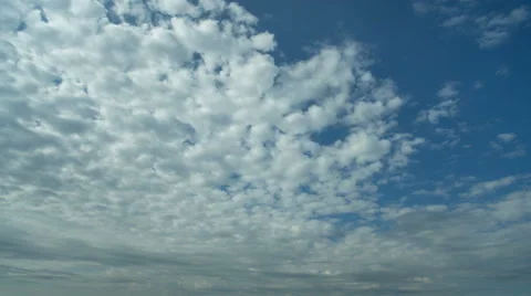 The flow of cloud against the blue sky. Time lapse Stock Footage 62903254