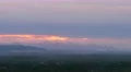 The flow of cloud against the sunset over the city. Time lapse 4k or 4k+ Resolution