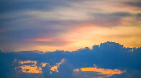 The flow of cloud against the sunset. Time lapse Stock Footage 62744927