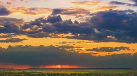 The flow of cloud against the sunset. Time lapse Stock Footage 62905760