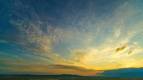 The flow of cloud against the sunset. Time lapse Stock Footage 62942411