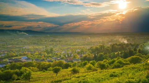 The flow of cloud against the sunset. Time lapse Stock Footage 62942803
