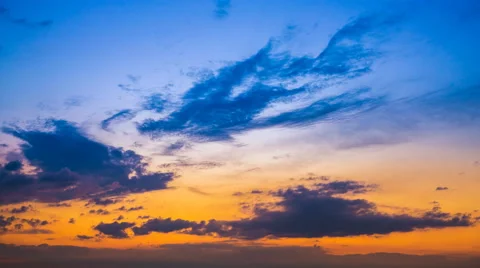 The flow of cloud against the sunset. Time lapse Stock Footage 62943691