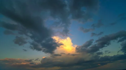 The flow of cloud against the sunset. Time lapse Stock Footage 63030034