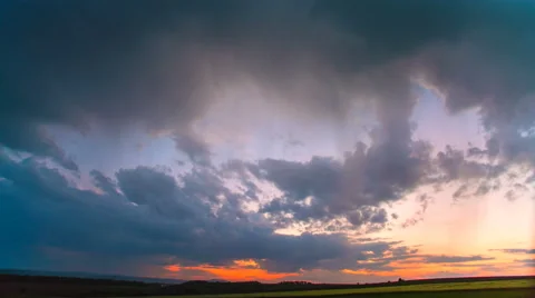 The flow of cloud against the sunset. Time lapse Stock-Footage 63032416