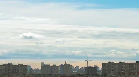 The flow of cloud on a background of the city. Time lapse Stock Footage 62744094