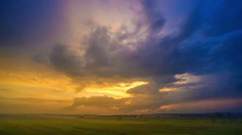 The flow of cloud on a background of the evening city. Real time capture Stock Footage