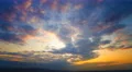 The flow of cloud on the sunset background. Time lapse. Wide angle 4k or 4k+ Resolution