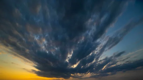 The flow of clouds on the sunset background. time lapse Stock-Footage 110424299
