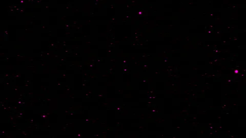 Flow of colored particles on black background. Motion. Colored roundels move in Video stock 195039540
