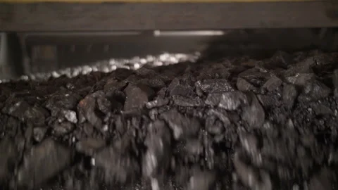 Flow of fine coal flowing through the vibrator, slow motion Stock Footage 205219491