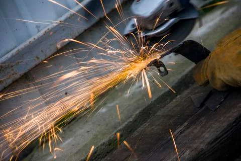 Flow of flying sparks when working a circular saw for metal 스톡 사진