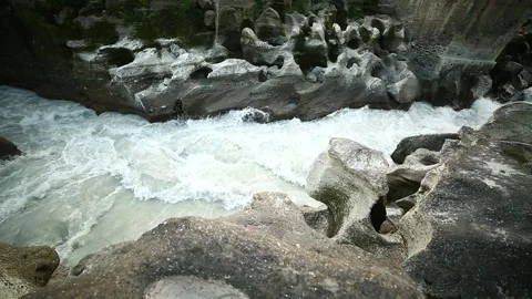 Flow Of Fresh Water  Flowing Through Stone And Rocks Stock Footage 137226808