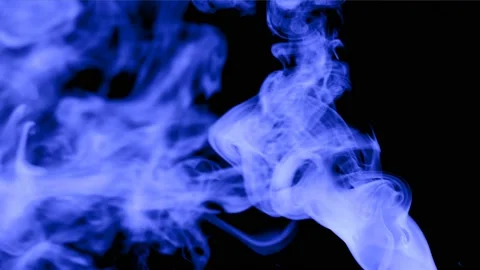 The flow of light blue smoke on a black background Stock Footage 96777636