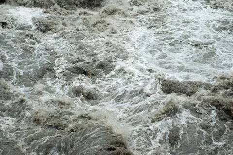 The flow of a mountain rapid river close-up. texture of mountain muddy river, Stock Photos