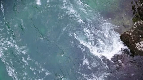 The flow of a mountain river with clear blue water. Stock Footage 248679581