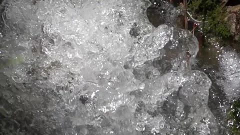 Flow of a mountain stream in nature in slow motion Stock Footage 310209950