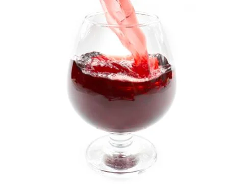 Flow patterns of red wine Foto stock