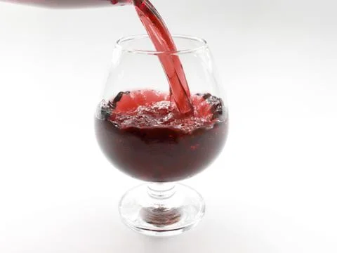 Flow patterns of red wine Foto stock