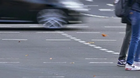 Flow of Pedestrians Crossing Street at Crosswalk Towards Each Other on The Stock Footage