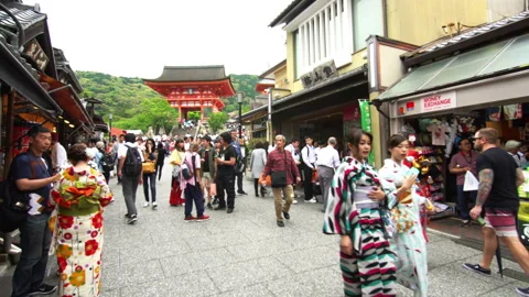 Flow of people going to Kiyomizu-dera - a Buddhist temple complex in Kyoto Stock Footage 105226504