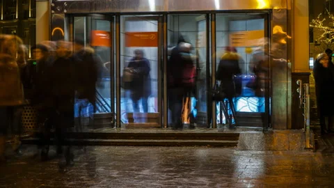 The flow of people passing through the  doors of the metro station, time laps Stock Footage 85816459