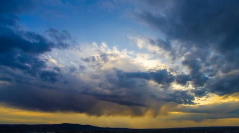 The flow of rain cloud on a background of the evening city. Time lapse Stock Footage 61736803