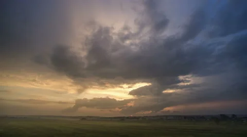 The flow of rain cloud on a background of the evening city. Time lapse Stock Footage 62257899