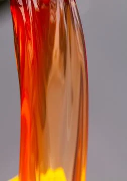 Flow of red diesel 写真素材