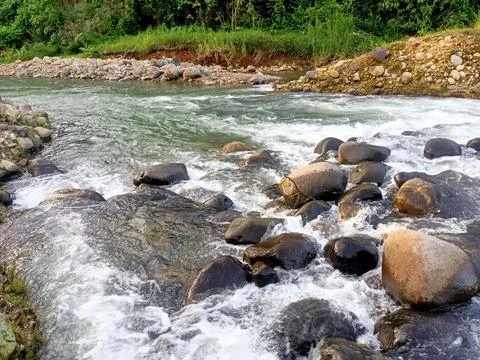 The flow of river water is clean and the water is clear Stock Photos