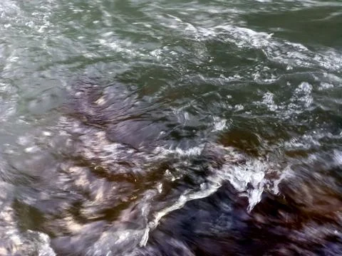 The flow of river water is clean and the water is clear Stock Photos