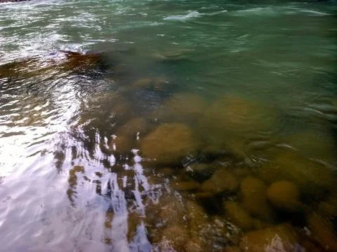 The flow of river water is clean and the water is clear Stock Photos
