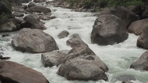 The flow of river water during the monsoon in the Himalayan hills Video stock 156298757