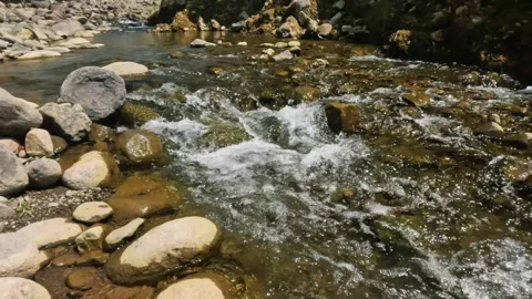 The flow of a rocky and clear mountain river Video stock 321810753