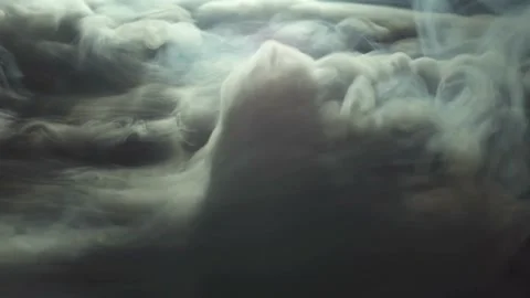 The flow of thick smoke on the dark background slow motion capture Stock Footage 146206626