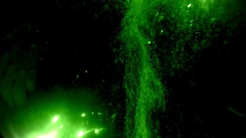 Flow of Vivid Green Bubbles Rises up on Background Impenetrable Blackness Stock Footage 76389074