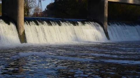 Flow of water in an artificial dam Stock Footage 142740987