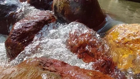 The flow of water flows fast in a clean river Video stock 303390321