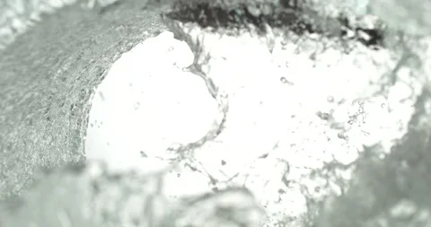 Flow of WATER forming a SPIRAL shape in super slow motion Stock Footage 154899441