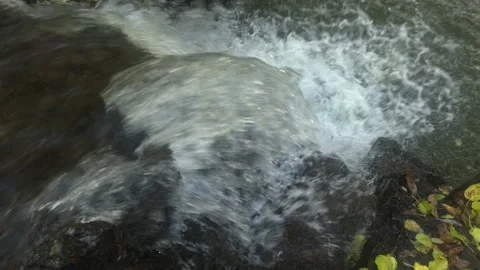 Flow of water in a mountain river Stock Footage 159289831