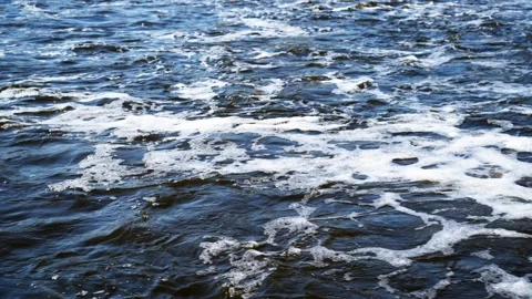 The flow of water from the outlet of an artificial dam Stock Footage 241666746